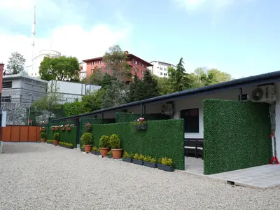 a building with plants and potted plants on it at Mia Mia Suites in Istanbul