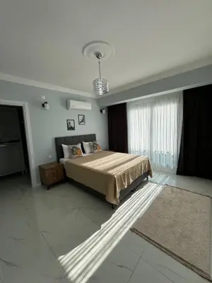 a bedroom with a large bed in a room at Sapanca Villa Dereiçi in Sapanca
