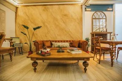 a living room with a couch and a table at Blu Macel Hotel & Suites -Old City Sultanahmet in Istanbul