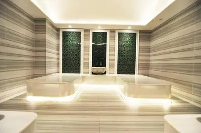 a spa room with two sinks and two windows at Bright Lovely Modern 2BD25 Condo PoolGym! #220 in Istanbul