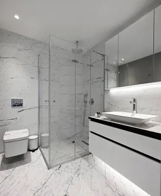 a bathroom with a shower and a sink and a toilet at Beautiful Modern 1BD Condo Views w PoolGym! #223 in Istanbul