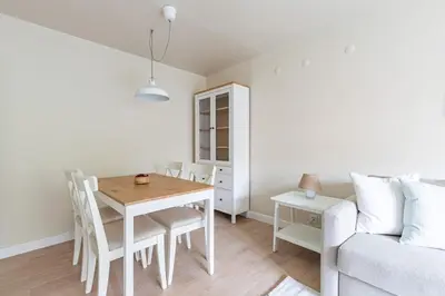a living room with a table and a couch at Modern Prime Location 1Bed Bright Home! #243 in Istanbul