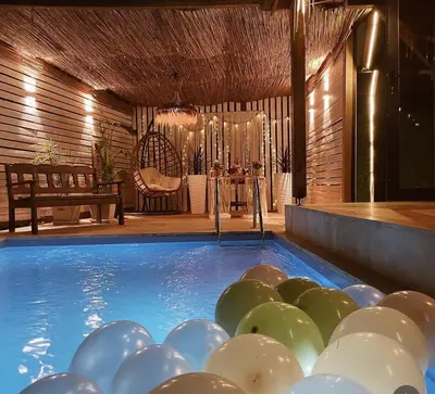 a pool with a bunch of white and green balls in it at MİNNA BUTİK EV in Sapanca