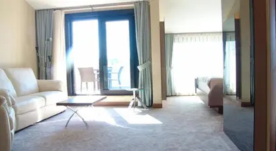 a living room with a couch and a table at Inera Hotel Pendik in Istanbul