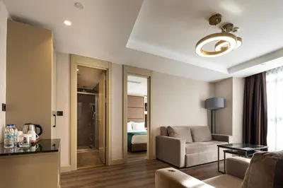 a living room with a couch and a table at THE NEST HOTEL in Istanbul