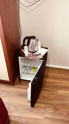 a stove with a tea kettle on top of it at YUNUS OTEL in Istanbul
