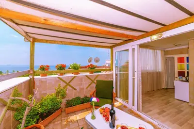 a balcony with a view of the ocean at Walnut Shell Hotel in Istanbul