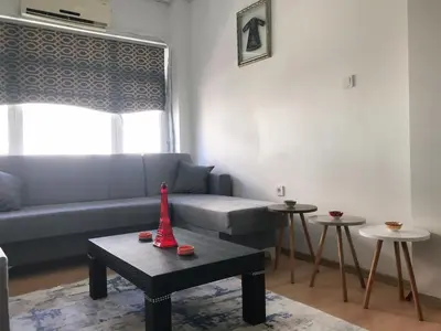 a living room with a couch and a table at Apartment sultanahmet in Istanbul