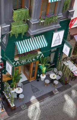 an overhead view of a restaurant with tables and chairs at Istiklal Street Taksim House Yamalya Hotel in Istanbul