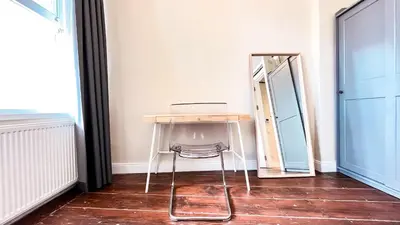 a dressing table and a mirror in a room at Homie Suites - Historical Apartments in the center of Beşiktaş in Istanbul