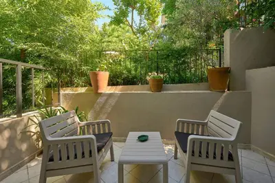 two chairs and a table on a patio at Cozy Cute 1 bed1bath Bebek Private Terrace! #75 in Istanbul