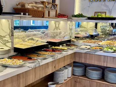 a buffet line with many different types of food at Boutique Dedem Hotel Sultanahmet in Istanbul