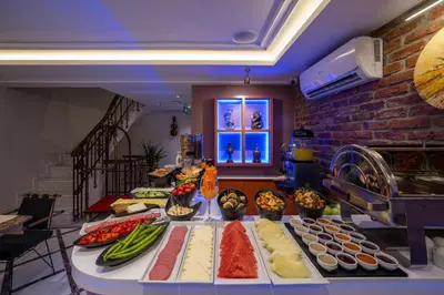 a table with many different types of food on it at Pera Luna Premium Hotel in Istanbul