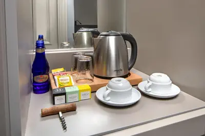 a kitchen counter with a tea kettle and dishes on it at Union Hotel Plat Inn -Special Category in Istanbul