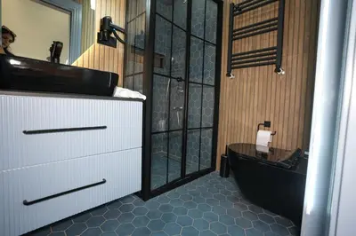a bathroom with a toilet and a sink and a tub at Dream house 22 in Istanbul