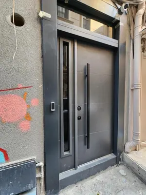 a gray door on the side of a building at Karaköy in Karaköy Hotel in Istanbul
