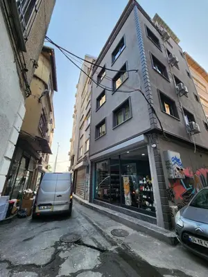 a van parked in front of a building on a street at Karaköy in Karaköy Hotel in Istanbul