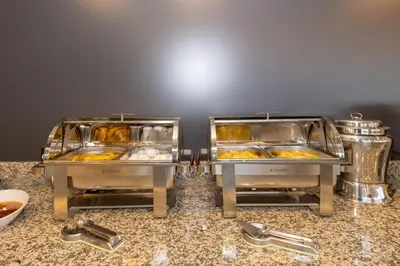 two trays of food sitting on top of a counter at Metro Hotel in Istanbul