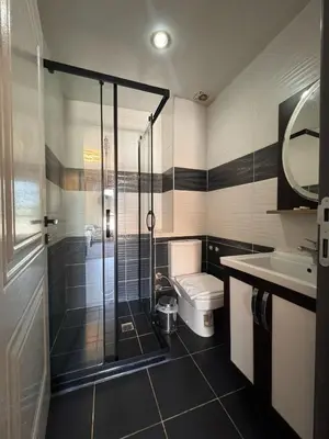 a bathroom with a shower and a toilet and a sink at İSTA PALACE-GRAND BAZAAR in Istanbul