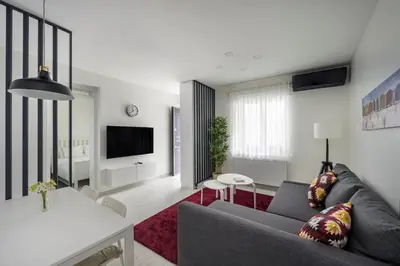 a living room with a couch and a table at Private Modern 2BR1Bath Bebek Gem! #80 in Istanbul