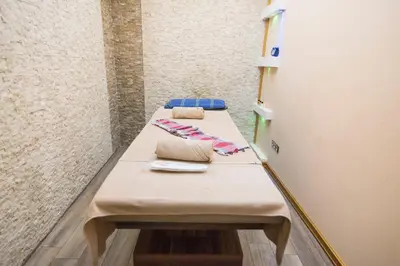 a table in a room with two beds at MidMar Deluxe Hotel in Istanbul