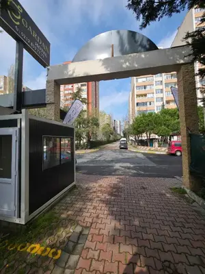 a brick street with a building in the background at Gardan Hotel in Beylikduzu