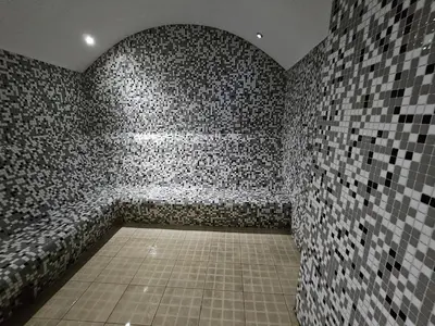 a black and white photo of a room with tiles at TAKSiM PERFECT RESiDENCE, 3 BEDROOMS, 140 M2, POOL GYM SAUNA ACCESS in Istanbul