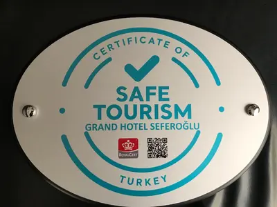 a sign that reads gate tourism grand hotel sherbrooke turkey at Grand Hotel Seferoğlu in Istanbul