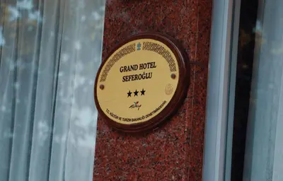 a small clock on the side of a wall at Grand Hotel Seferoğlu in Istanbul