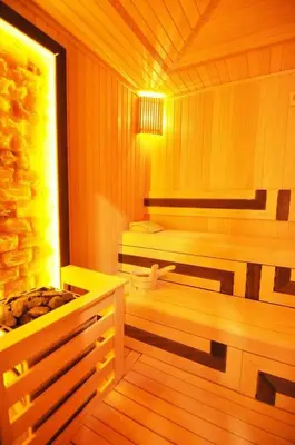 a room with a sauna with two benches in it at Scenic Bright Studio w Parking, PoolViews! #302 in Istanbul