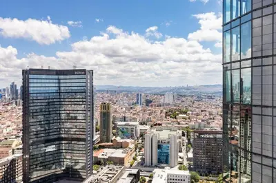 an aerial view of a city with tall buildings at Scenic Bright Studio w Parking, PoolViews! #302 in Istanbul