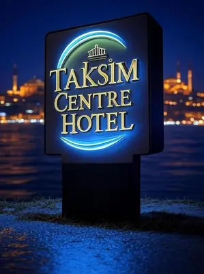 a sign for a taksim centre hotel at night at Taksim Centre Hotel in Istanbul