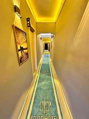 a hallway with a painted floor in a hotel at pilot hotel in Arnavutköy