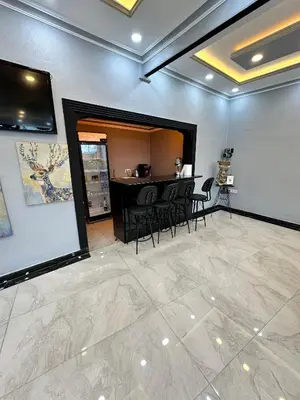 a large room with a table and chairs in it at pilot hotel in Arnavutköy