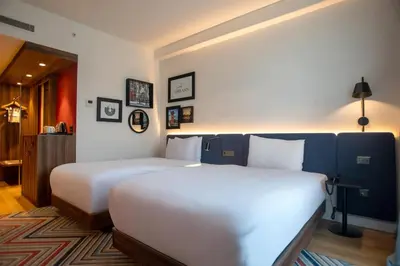 a hotel room with two beds in a room at Hampton By Hilton Sakarya in Sakarya