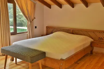 a bedroom with a bed and a window at Lal Hayal Konakları in Sakarya