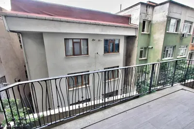 a balcony with a railing in front of a building at New Build with Modern Amenities and Balcony in Istanbul