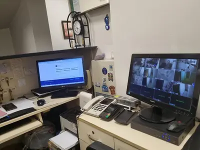 a desk with a computer monitor and a telephone at Hotel Hoyuk in Istanbul