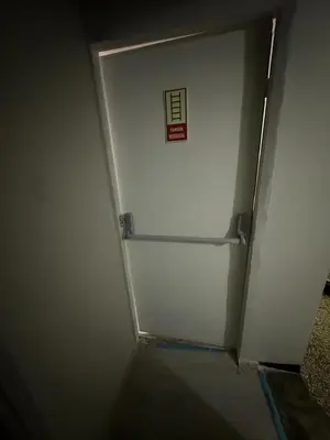 a white refrigerator with a sign on the door at Hotel Hoyuk in Istanbul