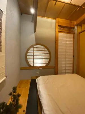 a bedroom with a bed and a window at Bunkahaus in Istanbul