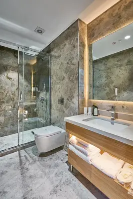 a bathroom with a tub and a sink and a shower at Rayelin Hotel Istanbul Old City in Istanbul