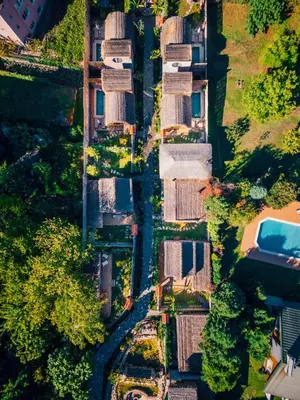 an overhead view of a row of houses in a city at Feronia Suites in Masukiye
