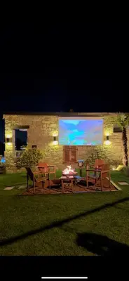 a group of chairs and a table in front of a building at Mjoraste Sapanca Boutique Villas in Sapanca
