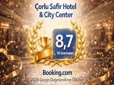 a gold star hotel and city center sign with a gold wreath at Çorlu Safir Hotel & City Center in Corlu