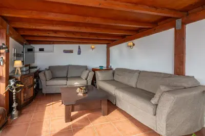a living room with a couch and a table at Bosphorus view-Airport shutle-High Speed WIFI-Private parking in Istanbul
