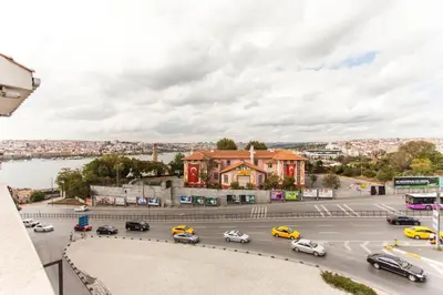 a busy city street with cars on the road at Pera Life in Istanbul
