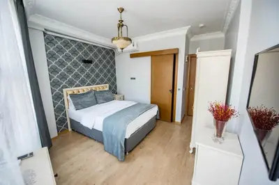 a bedroom with a bed in a room at Pera Life in Istanbul