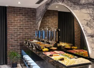 a buffet line with many different food items at Nex Hotel & Spa Istanbul in Istanbul