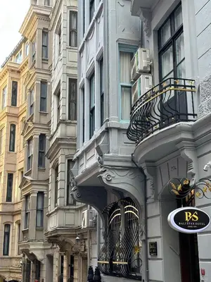 a building with a sign on the side of it at Bali Star City Hotel in Istanbul