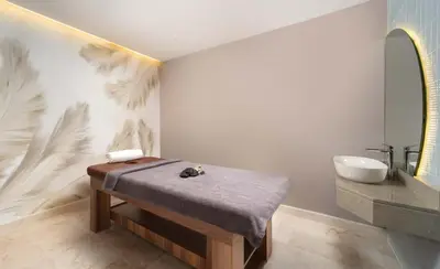 a bathroom with a table and a sink at Bentley Hotel Old City-Special Class in Istanbul